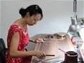 巧用科技注新思——記青年紫砂陶藝家張燚