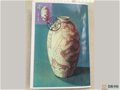 登上郵票的登封窯經典瓷器——白釉珍珠地刻劃花雙虎橄欖梅瓶